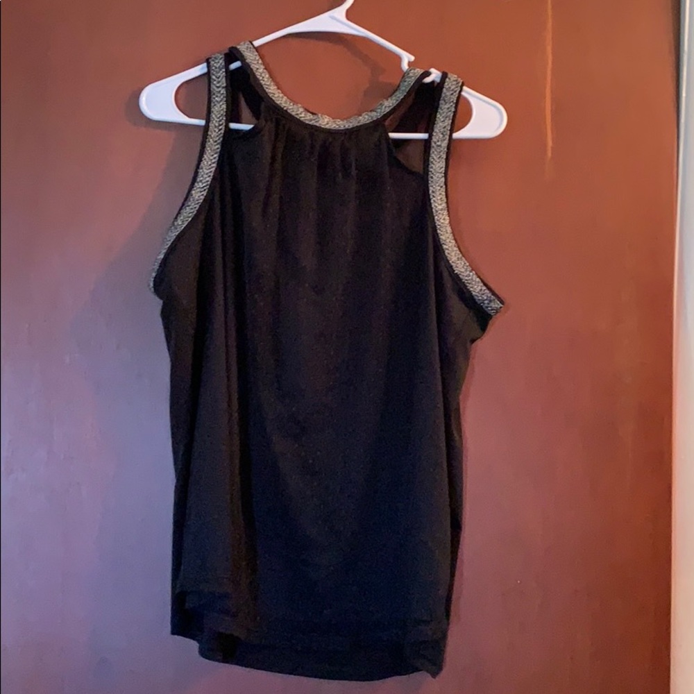 Maurice’s black lacy tank top